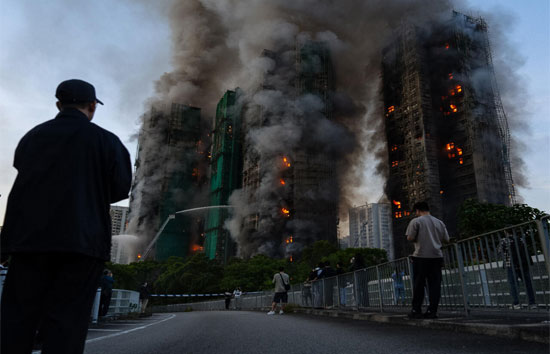 हॉन्ग कॉन्ग अग्निकांड में 128 मौतें...हाई राइज बिल्डिंग में शवों के मिलने का सिलसिला जारी 